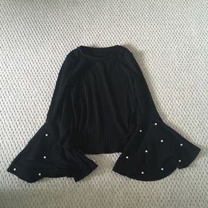 Black bat wing pearl top
